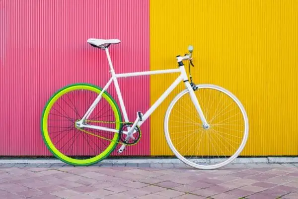 bicycle on pink and yellow background