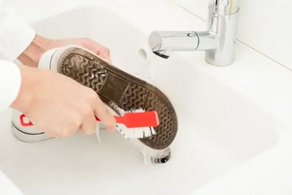 Cleaning Shoe Soles With Toothbrush