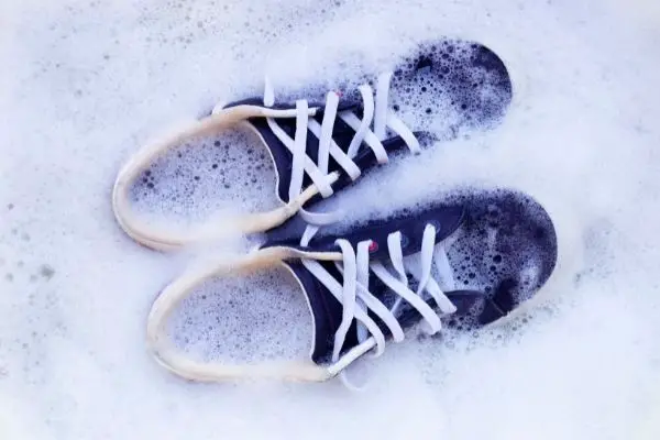Cleaning shoes with soap and water