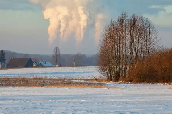Snowy Landscape With Carbon Emitting Polluters