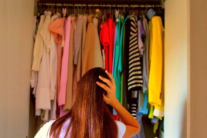 Woman Is Looking In Closet