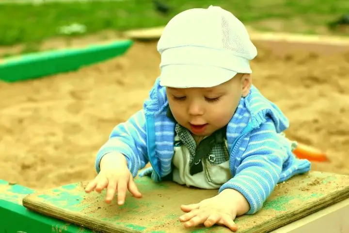 Babys Playing In Sandbox