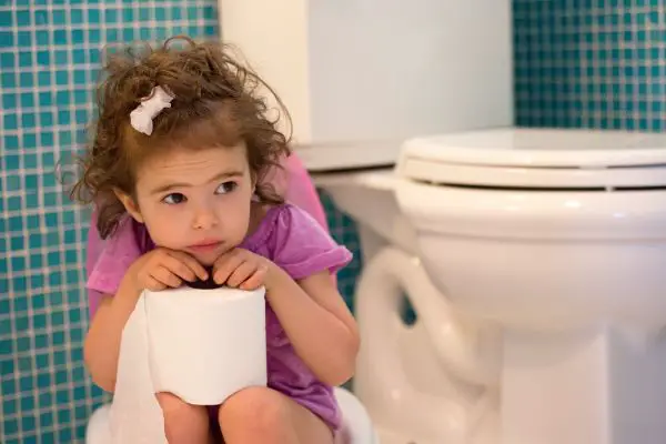 Child Holding Toilet Paper