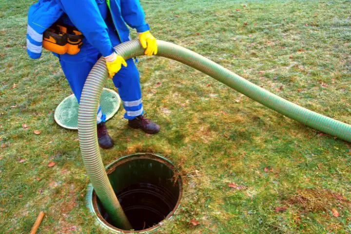 Man Is Emptying Septic Tank