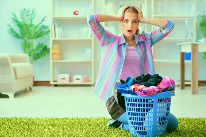 Woman Is Surprised Sitting Next To The Laundry
