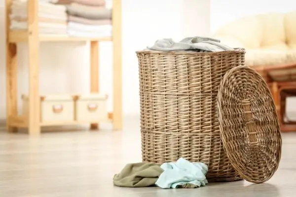 Wooden Laundry Basket Full Of Clothes