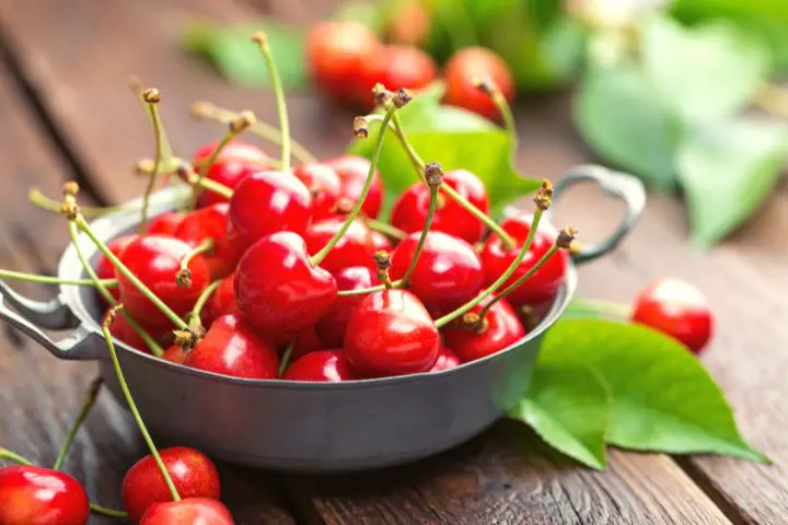 Cherries In Bowl On A Table