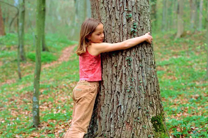Girl Hugging Tree