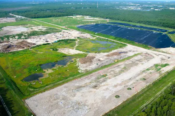 A Landfill And A Solar Farm Next To Each Other