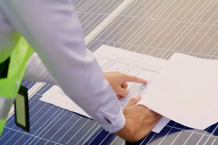 Man Installs Solar Panels For Farming