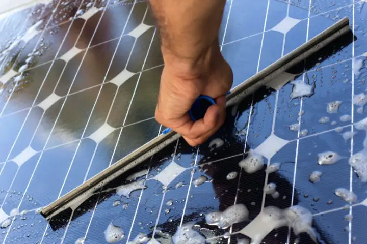 Cleaning Solar Panel With Window Cleaner
