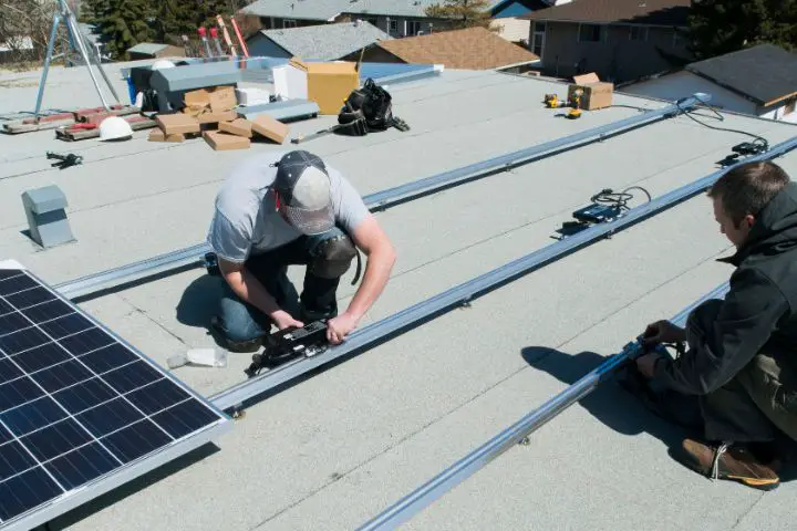 Men Install Compatible Mounts For Diy Solar Panels