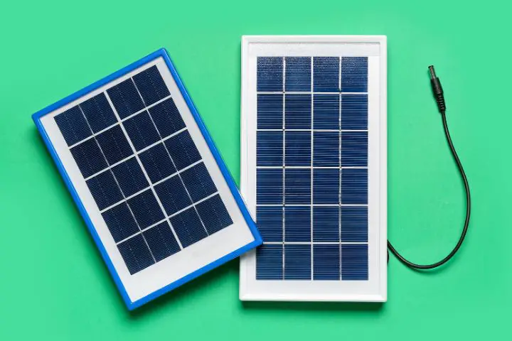 Portable Solar Panels On Green Background